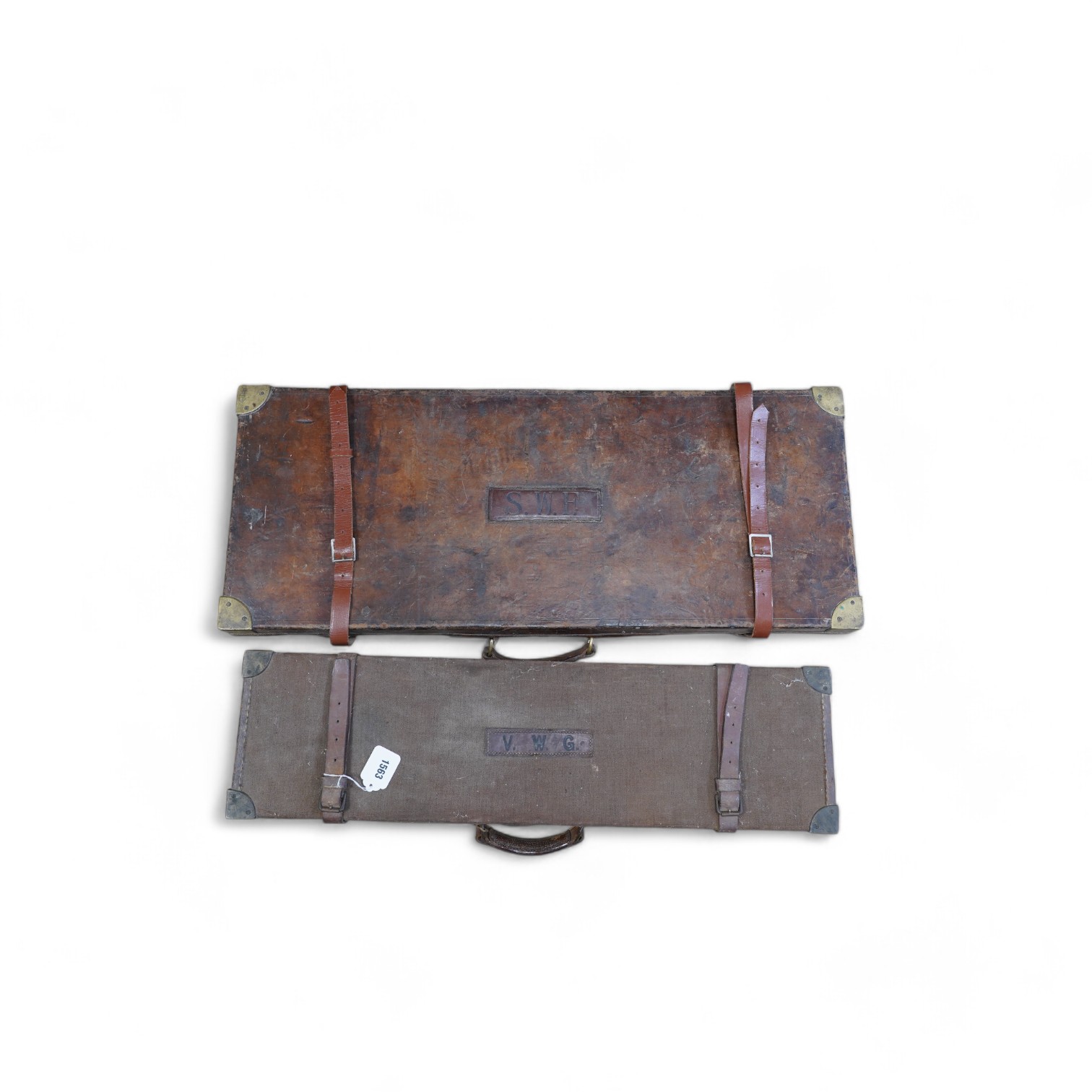 Two leather gun cases, largest 85cm wide, 34cm deep. Condition - fair considering age and use